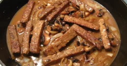 Tempeh medaljoni v sočni gobni omaki